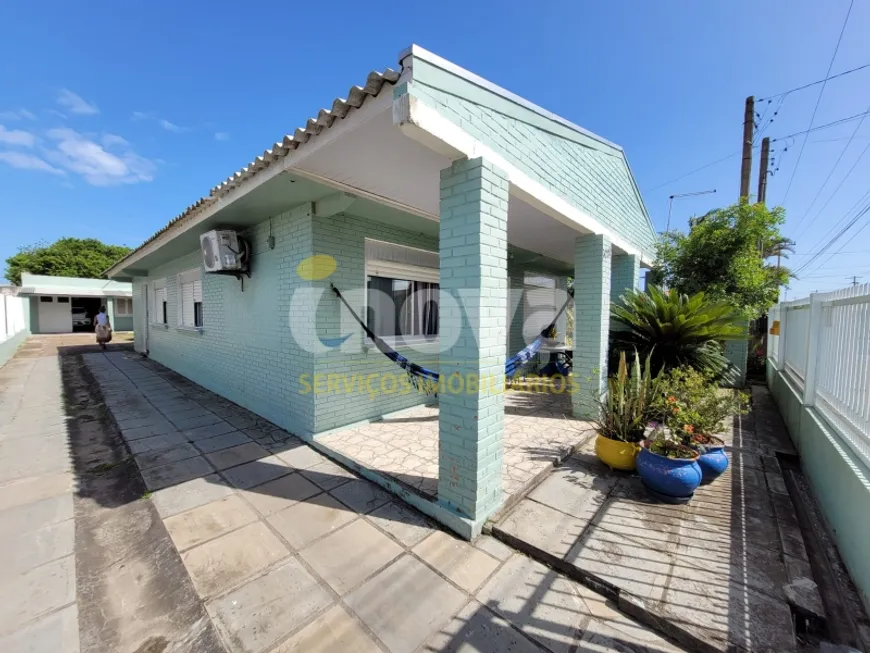 Foto 1 de Casa com 6 Quartos à venda, 200m² em Zona Nova, Tramandaí