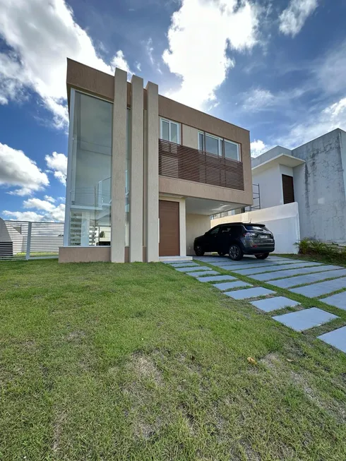 Foto 1 de Casa de Condomínio com 4 Quartos à venda, 400m² em Alphaville Abrantes, Camaçari