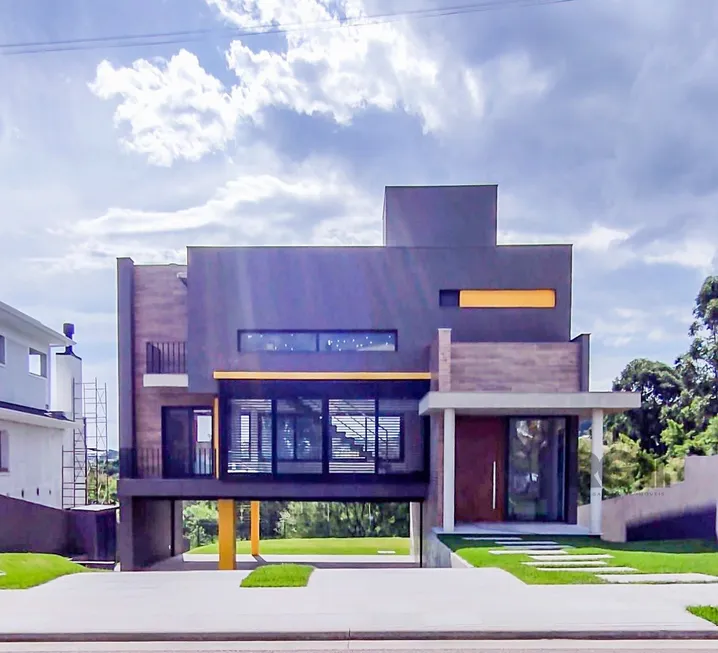 Foto 1 de Casa de Condomínio com 3 Quartos à venda, 279m² em Alphaville, Porto Alegre