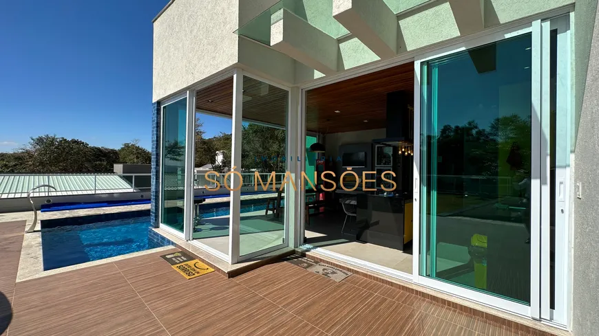 Foto 1 de Casa com 4 Quartos à venda, 610m² em Condominio Quintas do Sol, Nova Lima