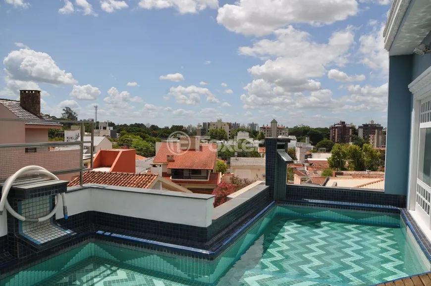 Foto 1 de Casa com 4 Quartos à venda, 526m² em Três Figueiras, Porto Alegre