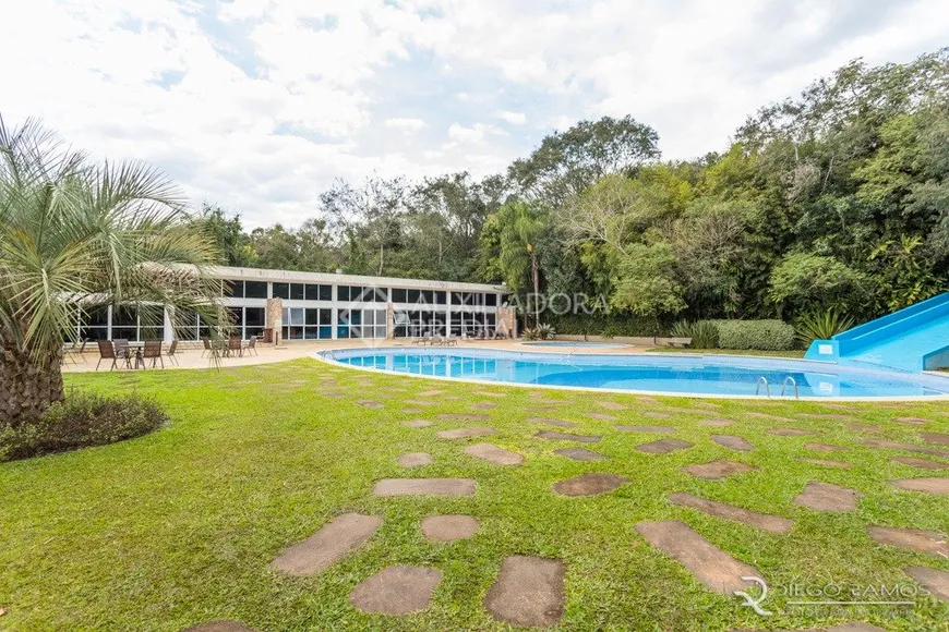 Foto 1 de Casa de Condomínio com 3 Quartos à venda, 230m² em Lomba do Pinheiro, Porto Alegre