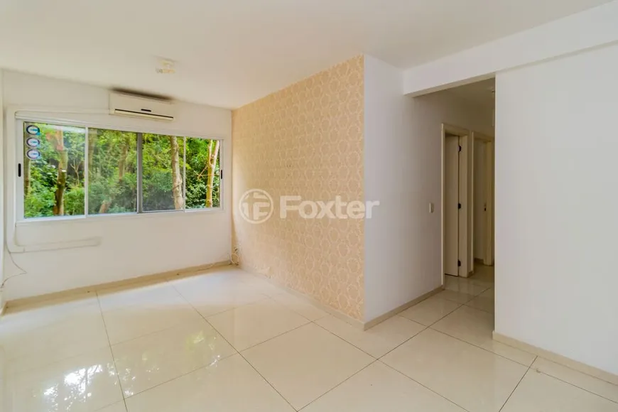 Foto 1 de Apartamento com 3 Quartos à venda, 66m² em Santo Antônio, Porto Alegre