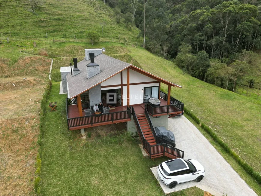 Foto 1 de Casa de Condomínio com 4 Quartos à venda, 220m² em Invernadinha, Rancho Queimado