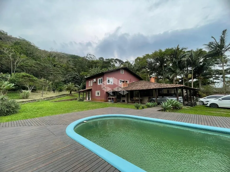 Foto 1 de Casa com 7 Quartos à venda, 550m² em Armação do Pântano do Sul, Florianópolis