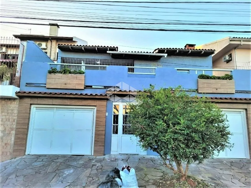 Foto 1 de Casa com 3 Quartos à venda, 176m² em Jardim Itú Sabará, Porto Alegre