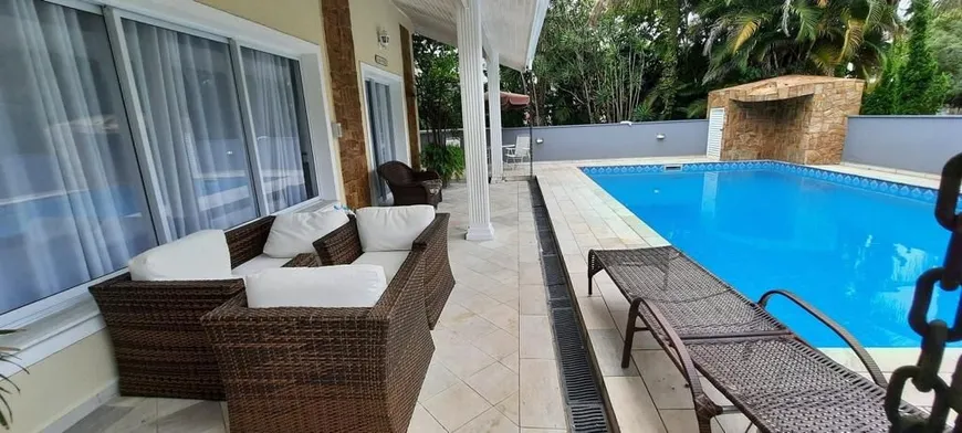 Foto 1 de Casa com 4 Quartos à venda, 300m² em Riviera de São Lourenço, Bertioga