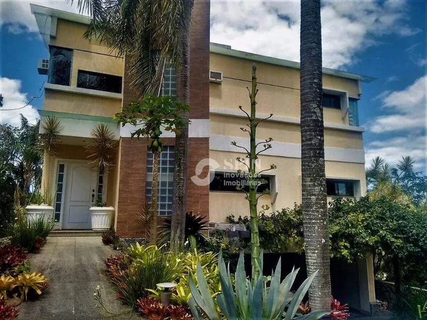 Foto 1 de Casa de Condomínio com 4 Quartos à venda, 470m² em Camboinhas, Niterói