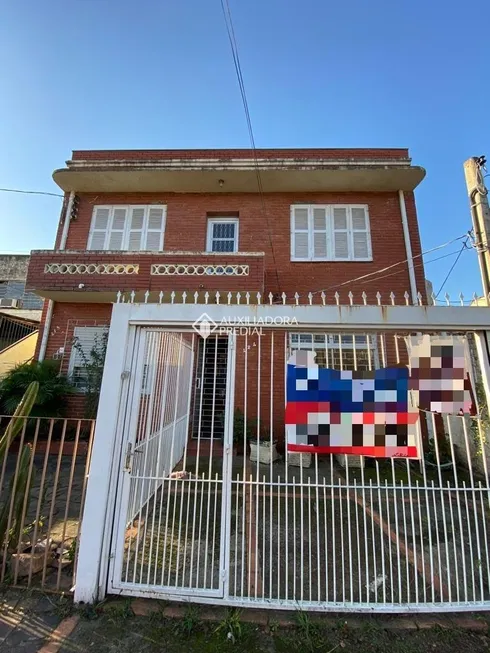 Foto 1 de Casa com 4 Quartos à venda, 97m² em São Geraldo, Porto Alegre