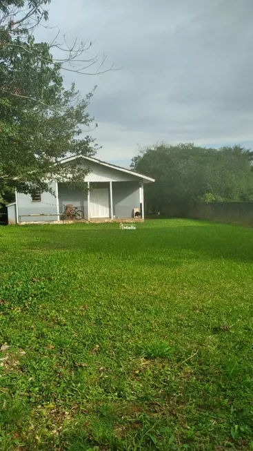 Foto 1 de Casa com 4 Quartos à venda, 121m² em Tarumã, Viamão