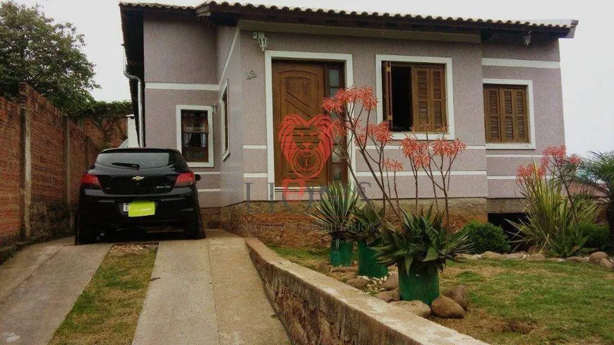 Foto 1 de Casa com 2 Quartos à venda, 50m² em Auxiliadora, Gravataí