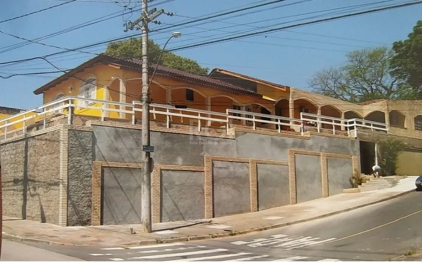 Foto 1 de Casa com 7 Quartos à venda, 401m² em Glória, Porto Alegre