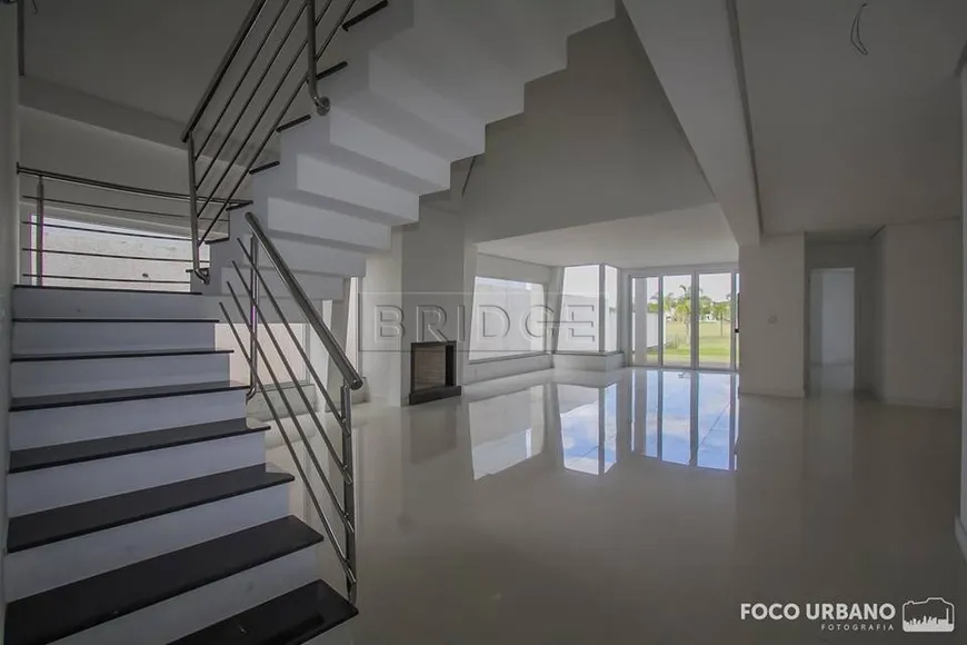 Foto 1 de Casa de Condomínio com 4 Quartos à venda, 334m² em Belém Novo, Porto Alegre
