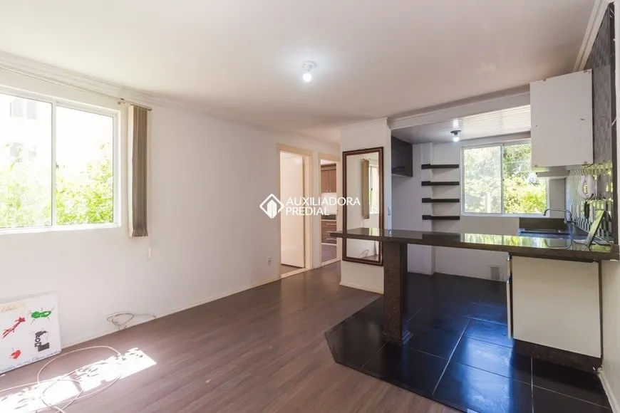 Foto 1 de Apartamento com 2 Quartos à venda, 43m² em Vila Nova, Porto Alegre