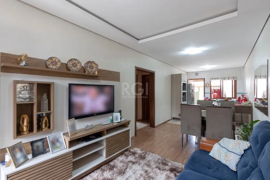 Foto 1 de Casa com 3 Quartos à venda, 121m² em Vila Nova, Porto Alegre