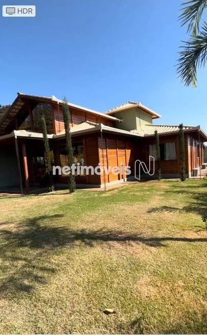 Foto 1 de Casa com 3 Quartos à venda, 300m² em Condominio Serra dos Bandeirantes, Mário Campos