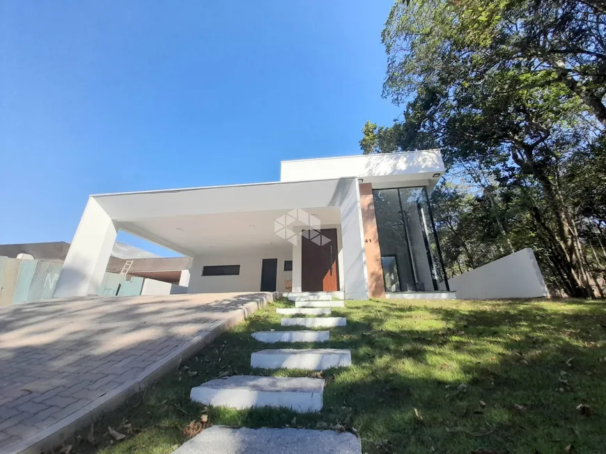 Foto 1 de Casa de Condomínio com 4 Quartos à venda, 201m² em Country, Santa Cruz do Sul