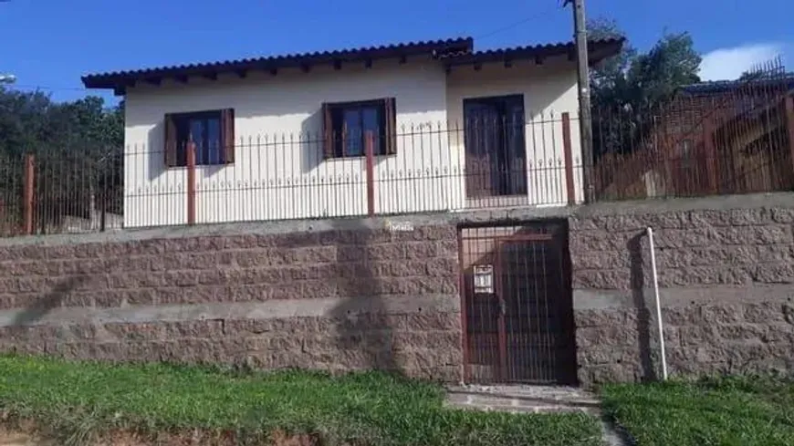 Foto 1 de Casa com 3 Quartos à venda, 100m² em Tarumã, Viamão