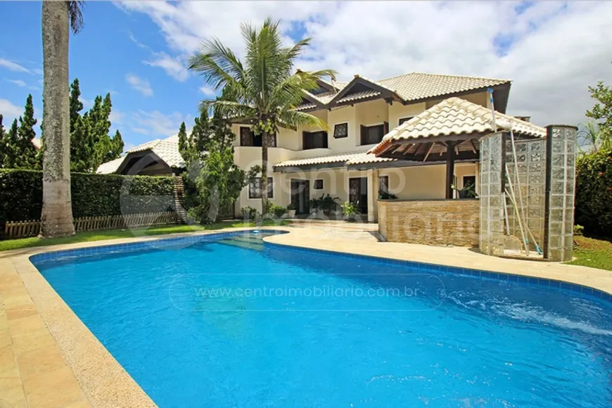 Foto 1 de Casa de Condomínio com 6 Quartos à venda, 579m² em Bougainvillee II, Peruíbe