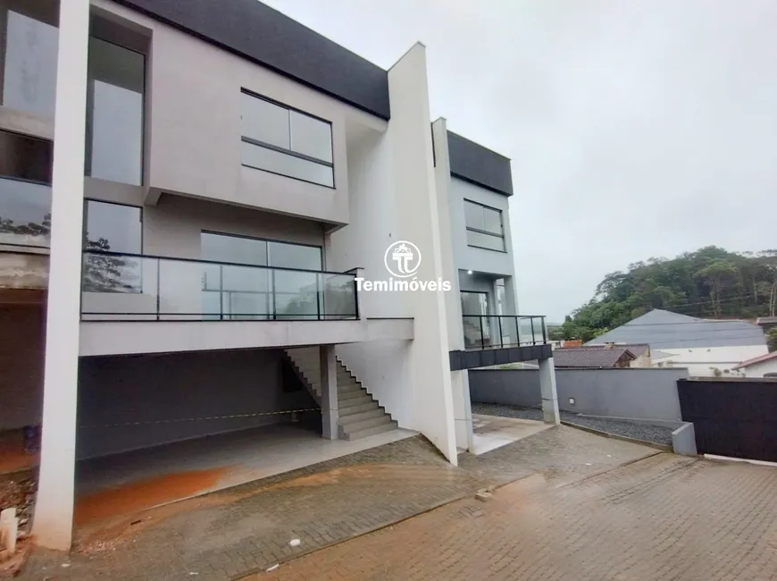 Foto 1 de Casa de Condomínio com 3 Quartos à venda, 180m² em Floresta, Joinville