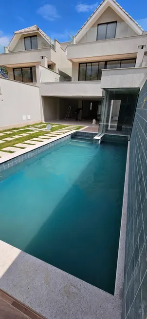 Foto 1 de Casa de Condomínio com 5 Quartos à venda, 440m² em Barra da Tijuca, Rio de Janeiro