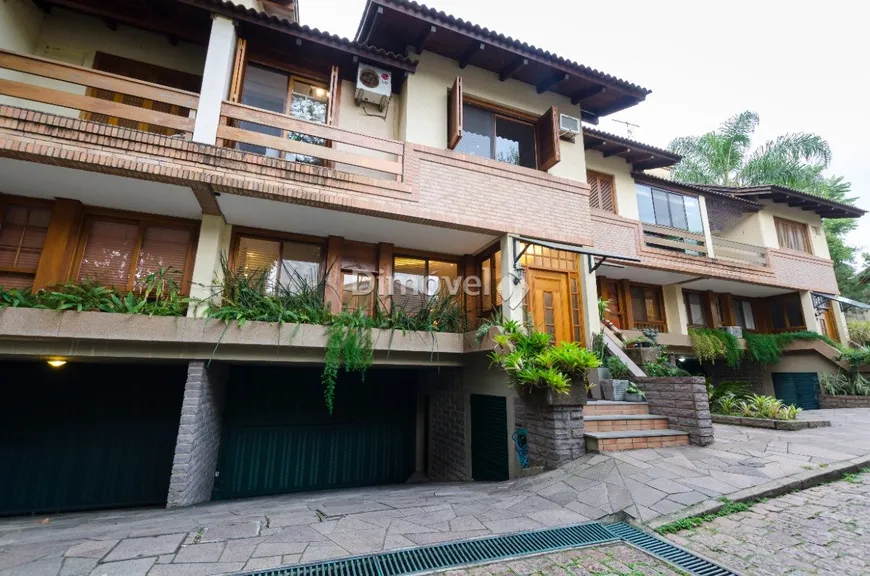 Foto 1 de Casa de Condomínio com 3 Quartos à venda, 246m² em Tristeza, Porto Alegre