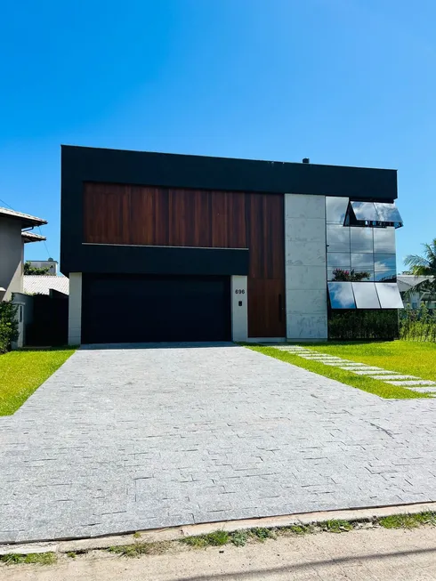 Foto 1 de Casa com 4 Quartos para alugar, 400m² em Jurerê Internacional, Florianópolis