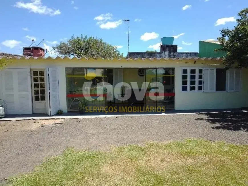 Foto 1 de Casa com 2 Quartos à venda, 94m² em Centro, Imbé