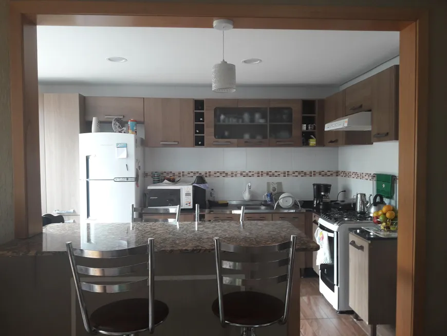 Foto 1 de Apartamento com 2 Quartos à venda, 63m² em Santa Fé, Porto Alegre