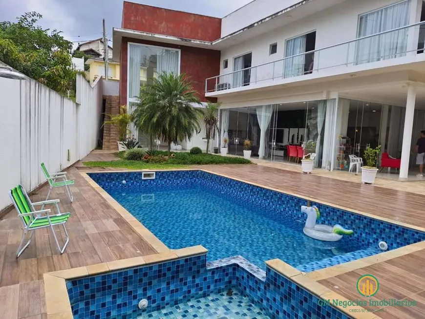Foto 1 de Casa de Condomínio com 4 Quartos à venda, 398m² em Jardim Caiapia, Cotia