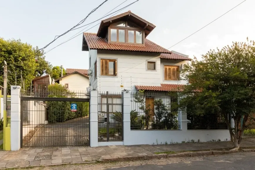 Foto 1 de Casa de Condomínio com 3 Quartos à venda, 216m² em Tristeza, Porto Alegre