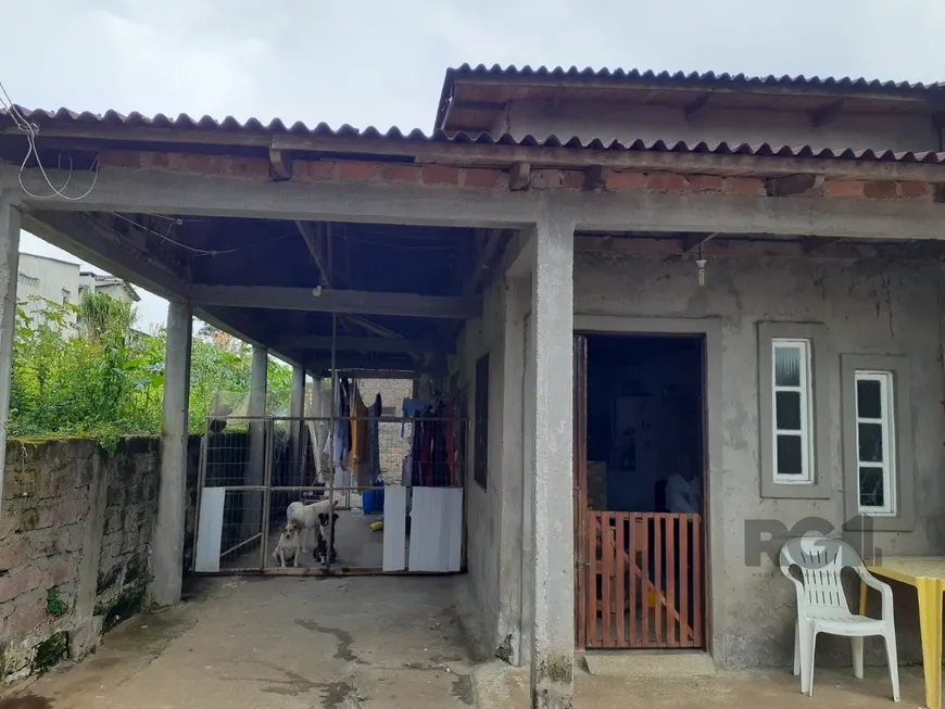 Foto 1 de Casa com 2 Quartos à venda, 59m² em Jardim Viamar, Viamão