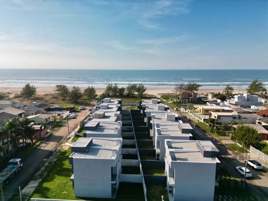 Foto 1 de Sobrado com 3 Quartos à venda, 123m² em Arco Iris, Capão da Canoa