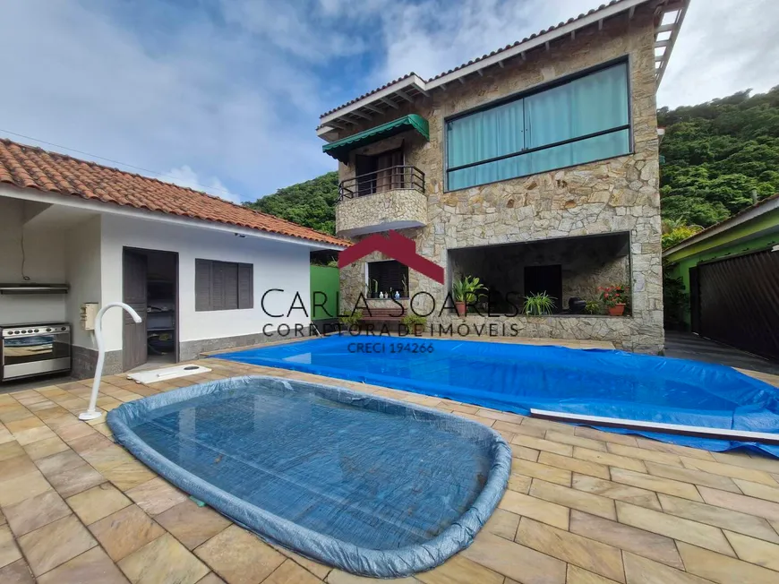 Foto 1 de Casa com 5 Quartos à venda, 382m² em Jardim Guaiúba, Guarujá