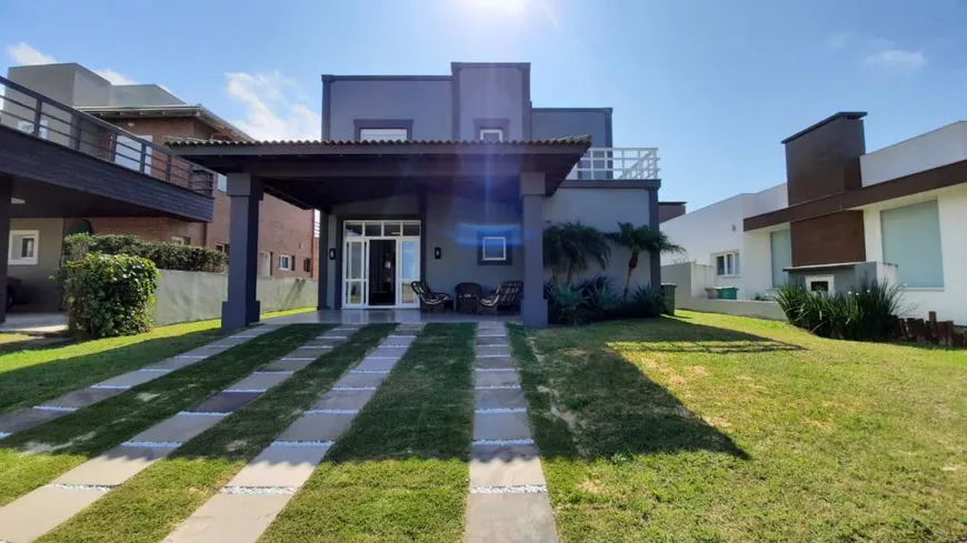 Foto 1 de Casa de Condomínio com 4 Quartos para alugar, 100m² em Condominio Quintas do Lago, Xangri-lá
