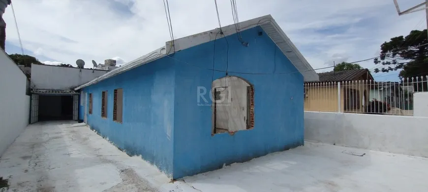 Foto 1 de Casa com 7 Quartos à venda, 201m² em Espiríto Santo, Porto Alegre