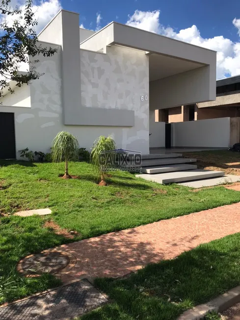 Foto 1 de Casa de Condomínio com 4 Quartos à venda, 217m² em Centro, Uberlândia