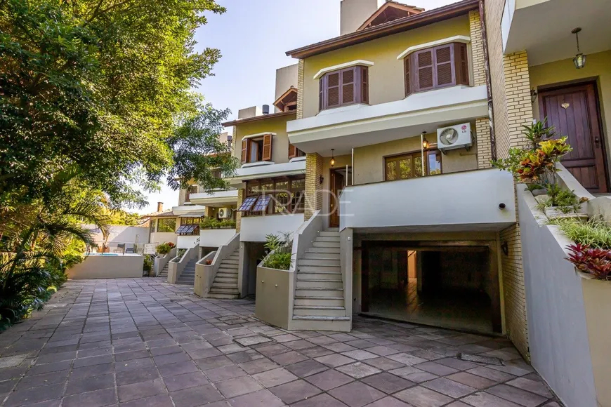 Foto 1 de Casa de Condomínio com 4 Quartos à venda, 317m² em Tristeza, Porto Alegre