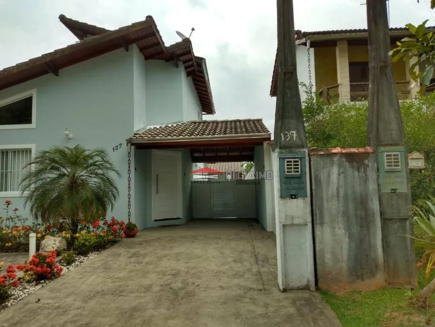 Foto 1 de Casa de Condomínio com 4 Quartos para venda ou aluguel, 191m² em Mar Verde II, Caraguatatuba