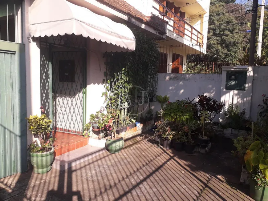 Foto 1 de Casa com 3 Quartos à venda, 92m² em Santo Antônio, Porto Alegre