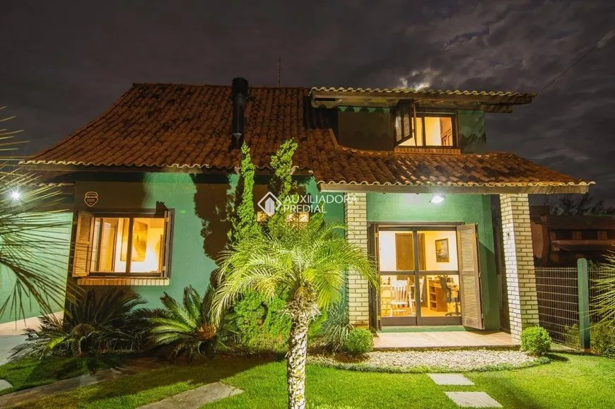Foto 1 de Casa com 3 Quartos à venda, 110m² em Barra de Ibiraquera, Imbituba
