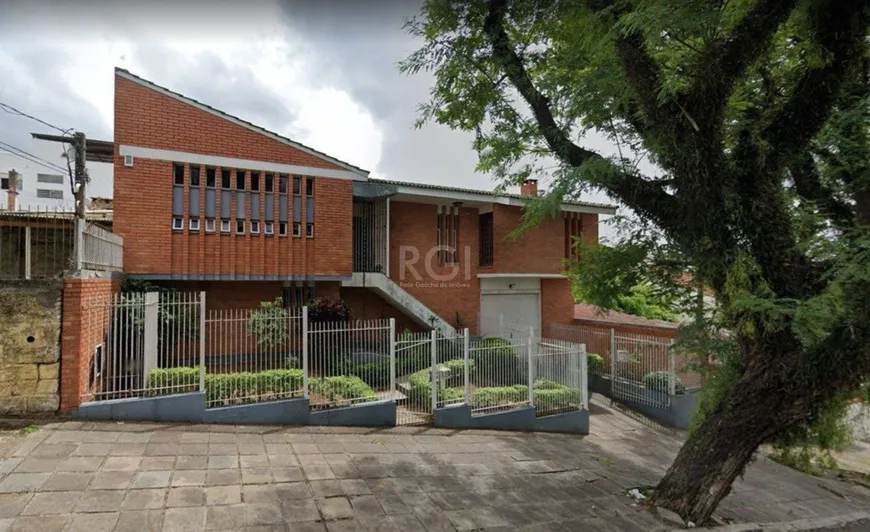 Foto 1 de Casa com 3 Quartos à venda, 351m² em Santo Antônio, Porto Alegre