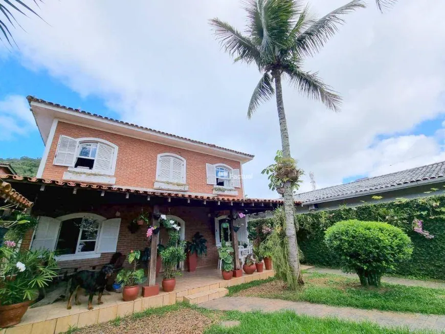 Foto 1 de Casa de Condomínio com 4 Quartos à venda, 159m² em Balneário Praia do Perequê , Guarujá