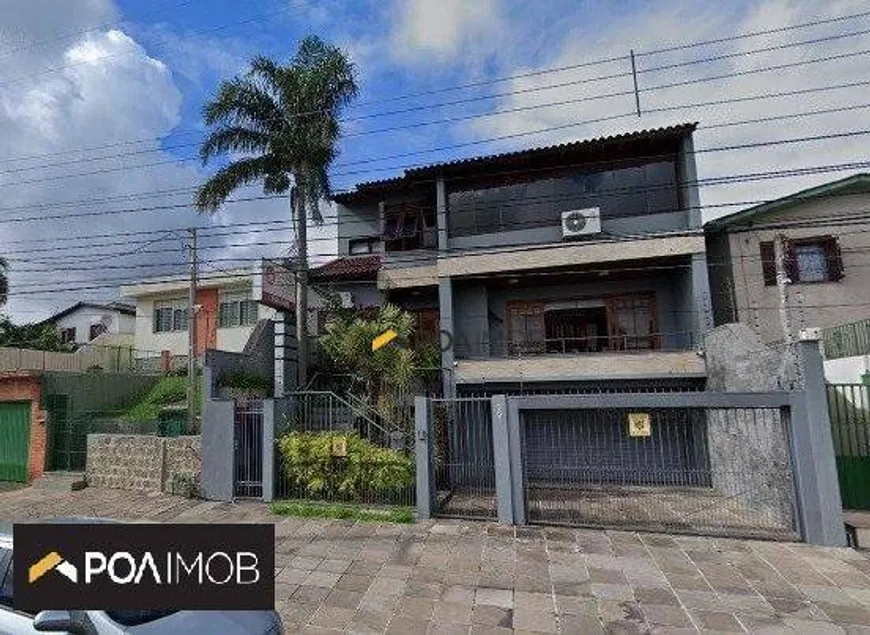 Foto 1 de Casa com 5 Quartos à venda, 550m² em Vila Jardim, Porto Alegre