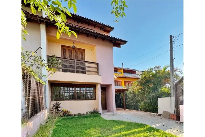 Foto 1 de Casa de Condomínio com 3 Quartos à venda, 130m² em Morro Santana, Porto Alegre