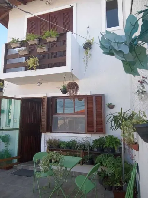 Foto 1 de Casa com 4 Quartos à venda, 73m² em Barra do Aririu, Palhoça