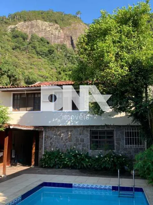 Foto 1 de Casa de Condomínio com 4 Quartos à venda, 330m² em Barra da Tijuca, Rio de Janeiro