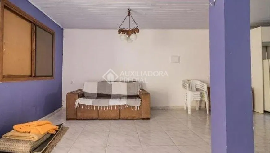 Foto 1 de Casa de Condomínio com 3 Quartos à venda, 290m² em Cavalhada, Porto Alegre