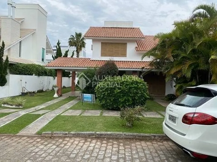 Foto 1 de Casa com 5 Quartos à venda, 236m² em Jurerê Internacional, Florianópolis