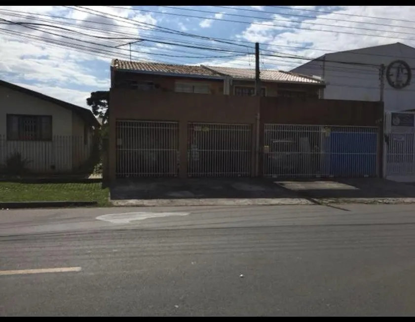 Foto 1 de Sobrado com 3 Quartos à venda, 220m² em Uberaba, Curitiba